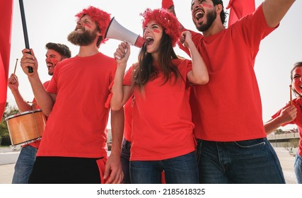 Sport Fans Screaming While Supporting Their Team Out Of The Stadium - Soft Focus On Center Girl Face