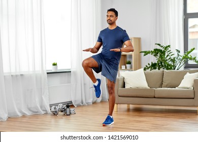 Sport, Fitness And Healthy Lifestyle Concept - Indian Man Running On Spot At Home