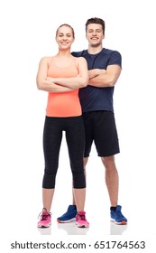sport, fitness, lifestyle and people concept - happy sportive man and woman