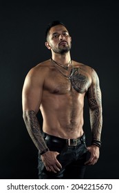 Sport And Fitness. Masculinity. Muscular Torso. Tempting Glance. Bearded Man With Tattooed Torso. Macho Sexy Bare Torso. Fit Model With Tattoo Art On Skin. Sportsman Or Athlete With Beard And Hair