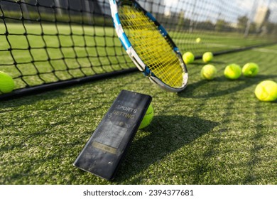 sport, fitness, technology, game and objects concept - close up of tennis racket with ball and tablet pc computer on wooden floor - Powered by Shutterstock