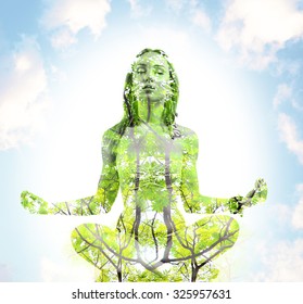 Sport, Fitness, Yoga, Double Exposure And People Concept - Happy Young Woman Meditating In Lotus Pose Over Blue Sky And Green Tree Background