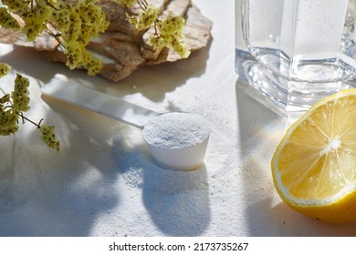 Sport food supplement powder with natural white background and props. Taurine, protein, vitamine, bcaa, amino acid or drug in a white scoop. Sport nutrition concept. - Shutterstock ID 2173735267