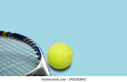 Sport and healthy lifestyle. Tennis. Yellow ball for tennis and a racket on table. Sports background with tennis concept.