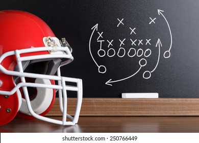 Sport Helmet In Front Of A Chalkboard With Football Play Strategy - Powered by Shutterstock