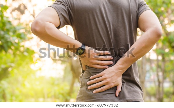 Sport injury, Man with back\
pain