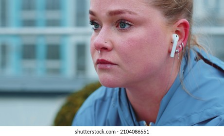 Sport Jogger Woman In Sportswear Getting Her Breath Back After Run Training, Sweat Dripping From Nose. Sporty Girl Making Cardio Workout Exercising Outdoors. Fitness, Aerobic, Weight Loss, Fat Burning