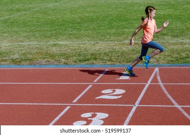 Sport For Kids, Active Child Running On Stadium Track, Little Girl Training, Fitness Concept
