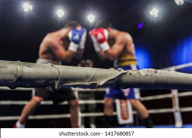 As In Sport As In Life: A Boxing Match Inside A Ring