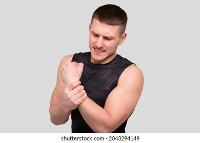 Sport Man Holding Wrist. Man Having Injury. Sport Man Wrist Injury