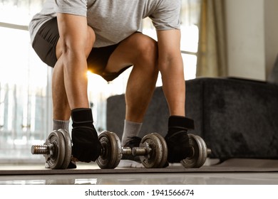 Sport Man Prepare Doing Dumbbell Exercise Workout In Home.