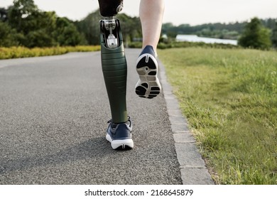 Sport man with prosthetic leg running training outdoor - Fitness and disability concept - Focus on prosthesis - Shutterstock ID 2168645879