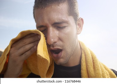 sport man resting after a hard workout - Powered by Shutterstock