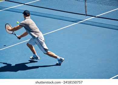 Sport, man and tennis on court with fitness, competition and performance outdoor with match and energy. Athlete, player and ball on turf for training, exercise and racket with skill, game and hobby - Powered by Shutterstock