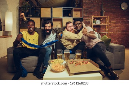 Sport Party. Group Of Friends Watching TV, Sport Match Together. Emotional Fans Cheering For Favourite Team, Watching Football. Concept Of Friendship, Leisure Activity, Emotions. Betting, Finance, Fun