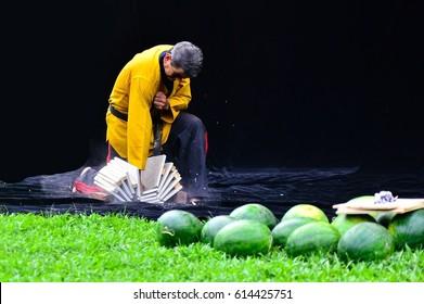 Sport And Recreation Concept. An Unidentify Taekwando Guy Breaking The Plates.