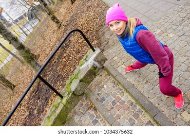 Sport And Recreation. Fit Slim Sporty Teen Girl Stretching Warming Up Outdoor In Park. Woman Exercising On Fresh Air.