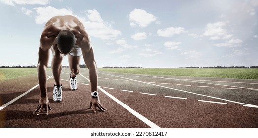 Sport. Runner. Athlete on  the start line. - Powered by Shutterstock