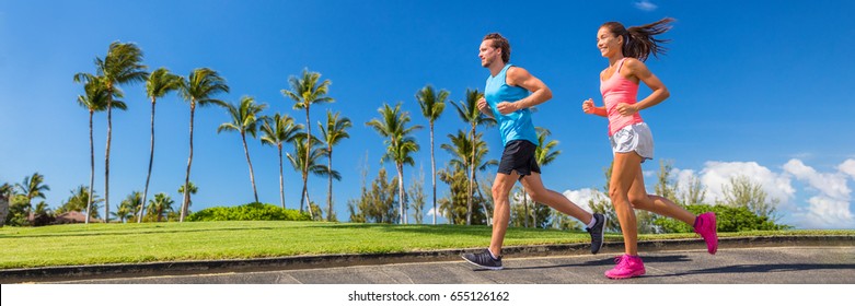 Sport Runners Running On Summer Park Road Banner - Couple Of Young People Jogging Training Cardio Together - Horizontal Crop For Landscape Copyspace.