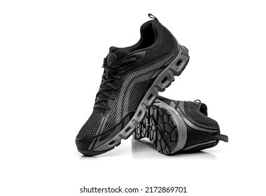 Sport shoes isolated on white background. Black sneakers running shoes.