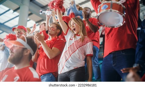 Sport Stadium Big Event: Crowd of Fans Cheer for Red Soccer Team to Win. People Celebrate Scoring a Goal, Championship Victory. Cute Caucasian Couple with Painted Faces Cheer, Shout. - Powered by Shutterstock