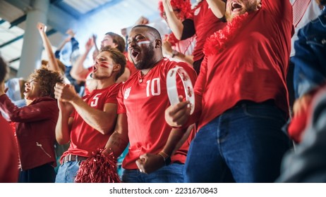 Sport Stadium Soccer Match: Diverse Crowd of Fans Cheer for their Red Team to Win. People Celebrate Scoring a Goal, Championship Victory. Group People with Painted Faces Cheer, Shout, Have Fun - Powered by Shutterstock