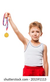 Sport Success And Win Concept - Smiling Athlete Champion Child Boy Hand Holding First Place Victory Gold Medal Award