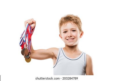 Sport Success And Win Concept - Smiling Athlete Champion Child Boy Hand Holding First Place Victory Gold Medal Award