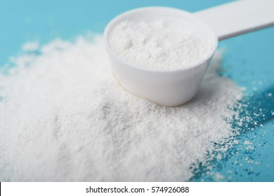 Sport supplement, creatine, hmb, bcaa, amino acid or vitamin mesure with powder. Sport nutrition concept. - Shutterstock ID 574926088