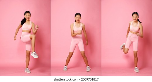 Sport Teenager girl walk, run and smile, do fashion power poses. 12 years old Asian Youth Athlete kid wear Pastel Pink Fitness cloth pants over pink background full length - Powered by Shutterstock