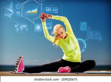 sport, training, technology and lifestyle concept - young woman exercising outdoors - Powered by Shutterstock