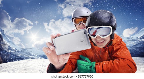 Sport And Travel Backgrounds. Winter, Ski, Snow And Fun - Family Enjoying Ski Holiday. Mobile Photo. Selfy.