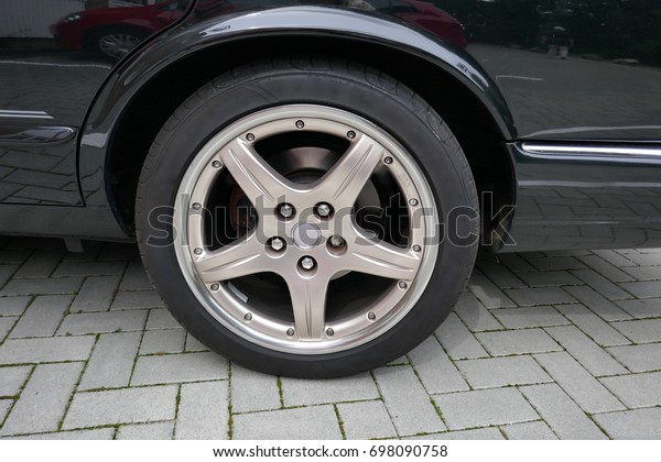 Sport wheel and rim\
of a black luxury car
