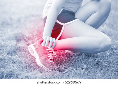 sport woman ankle injury in park, great for your design