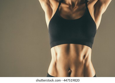 Sport. Woman sport body strong and beautiful