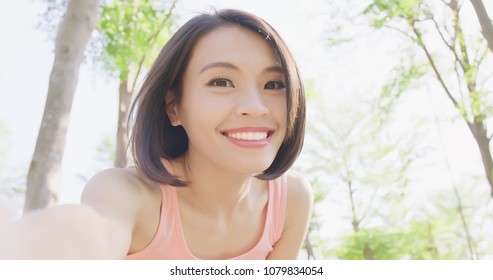 Sport Woman Selfie Happily In The Forest