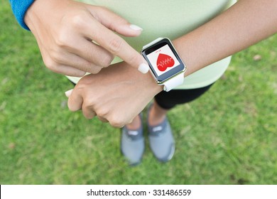 sport woman touch on hand watch health application 