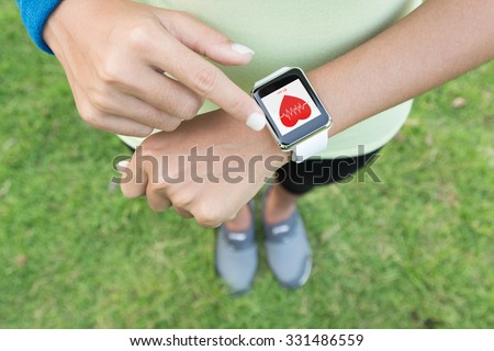sport woman touch on hand watch health application 