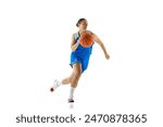 Sportive woman in blue basketball jersey dribbling in motion against white studio background. Female sportsman. Concept of professional sport, championship, tournament, hobby and recreation. Ad