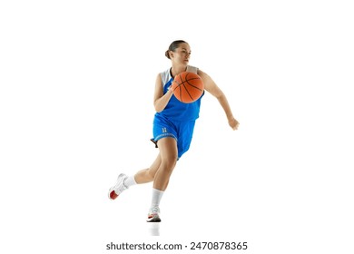 Sportive woman in blue basketball jersey dribbling in motion against white studio background. Female sportsman. Concept of professional sport, championship, tournament, hobby and recreation. Ad - Powered by Shutterstock