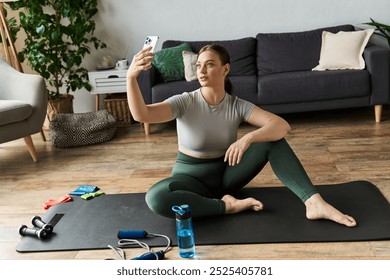 A sportive young woman in a crop top and leggings exercises at home, capturing her workout moment. - Powered by Shutterstock