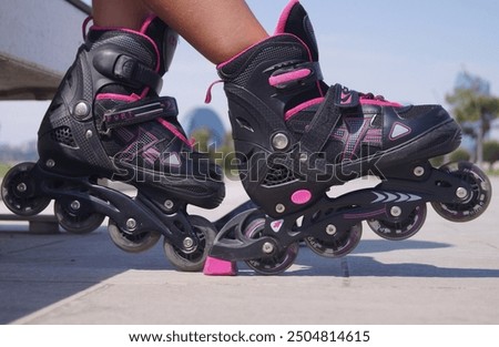 Similar – Woman in roller blades in skate park