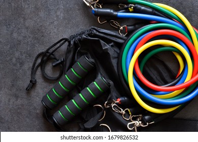Sports accessory - expander with a carbine on a dark background. - Shutterstock ID 1679826532