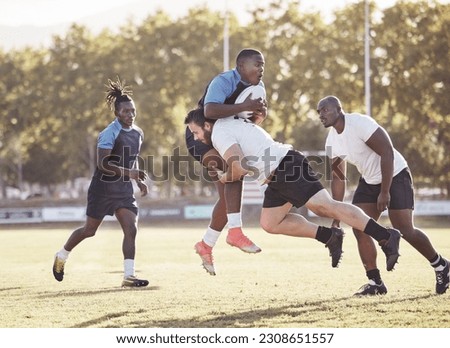 Sports action, rugby and men on field for match, practice and game in tournament or competition. Fitness, teamwork and players tackle for exercise, training and performance for winning ball to score
