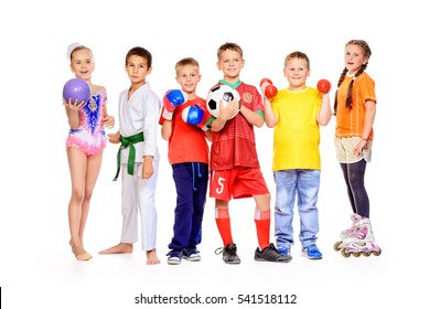 Sports and activities for children. Group of joyful boys and a girls engaged in various sports posing together. Education. Isolated over white background.