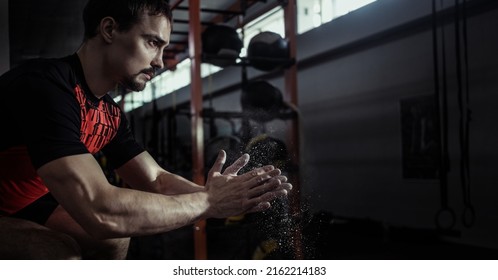 Sports Background. Fitness Man Doing Box Jump Workout At Gym.