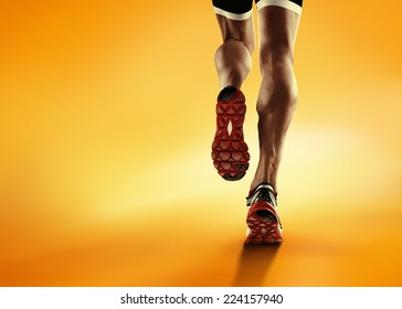 Sports background. Runner feet running closeup on shoe. - Powered by Shutterstock