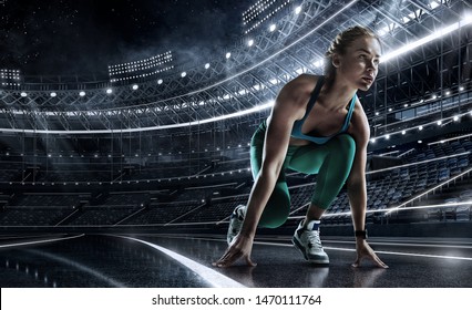 Sports background. Runner on the start line of the glowing stadium . Futuristic running track. Dramatic picture.