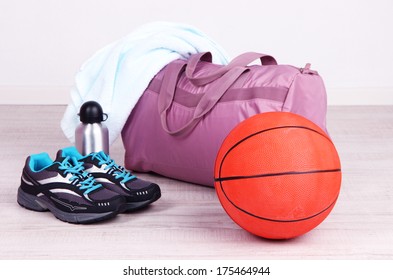 Sports Bag With Sports Equipment In Gymnasium