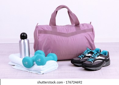 Sports Bag With Sports Equipment In Gymnasium